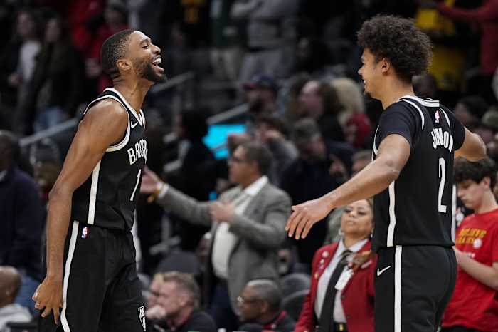 Brooklyn Nets forward Mikal Bridges (1) reacts with forward Cameron Johnson (2)